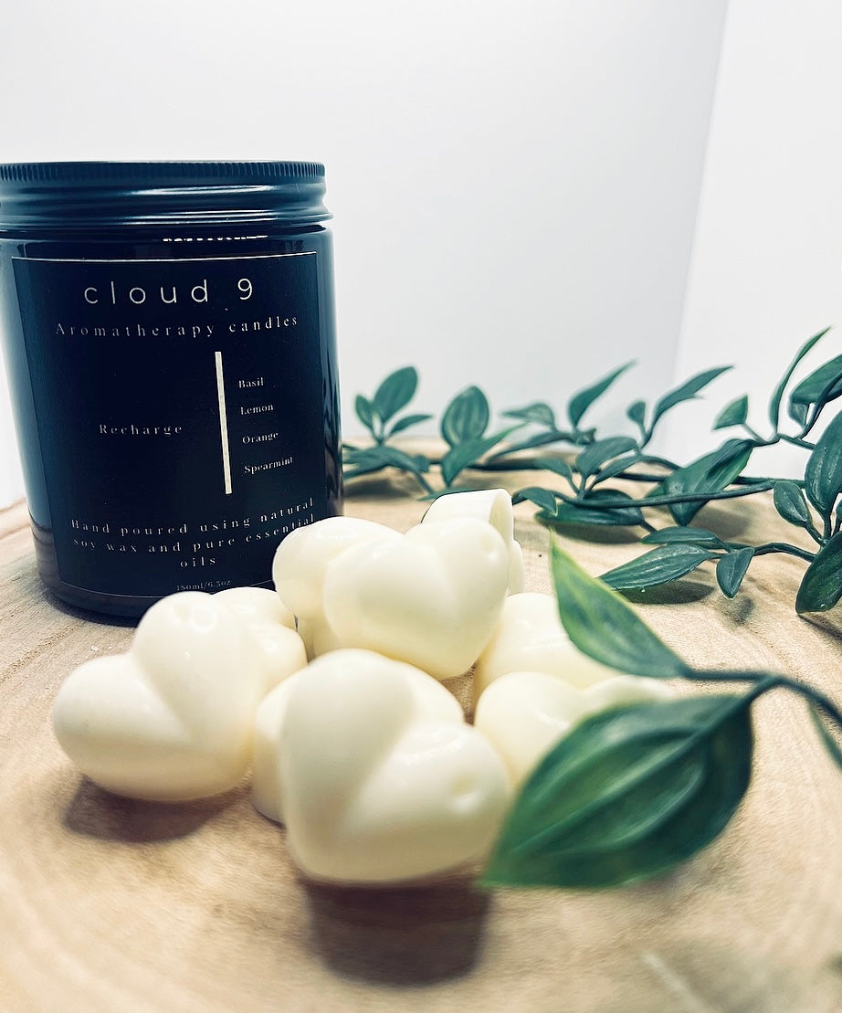 Recharge wax melts with essential oils including basil, spearmint , lemon and orange