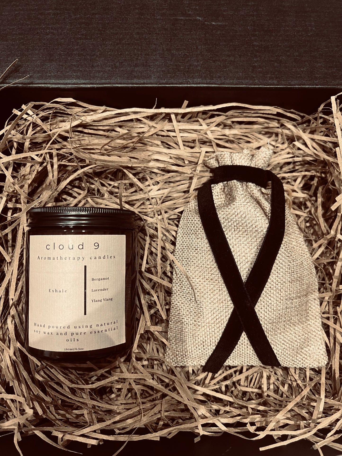 One Aromatherapy candle and one wax melt bag