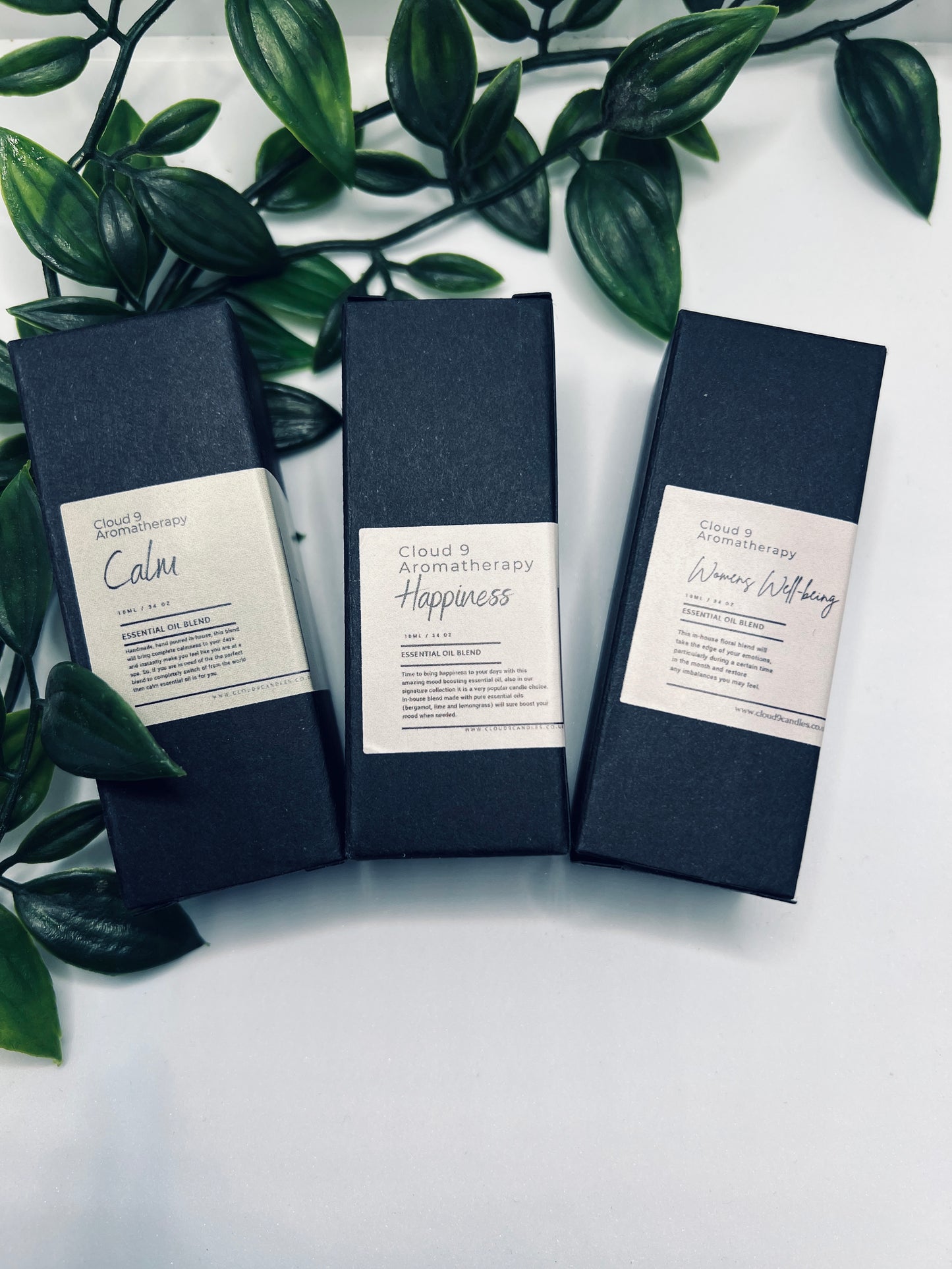 Cloud 9 Aromatherapy 3 Essential Oil Gift Set with three amber bottles, handcrafted natural blends for relaxation and well-being.