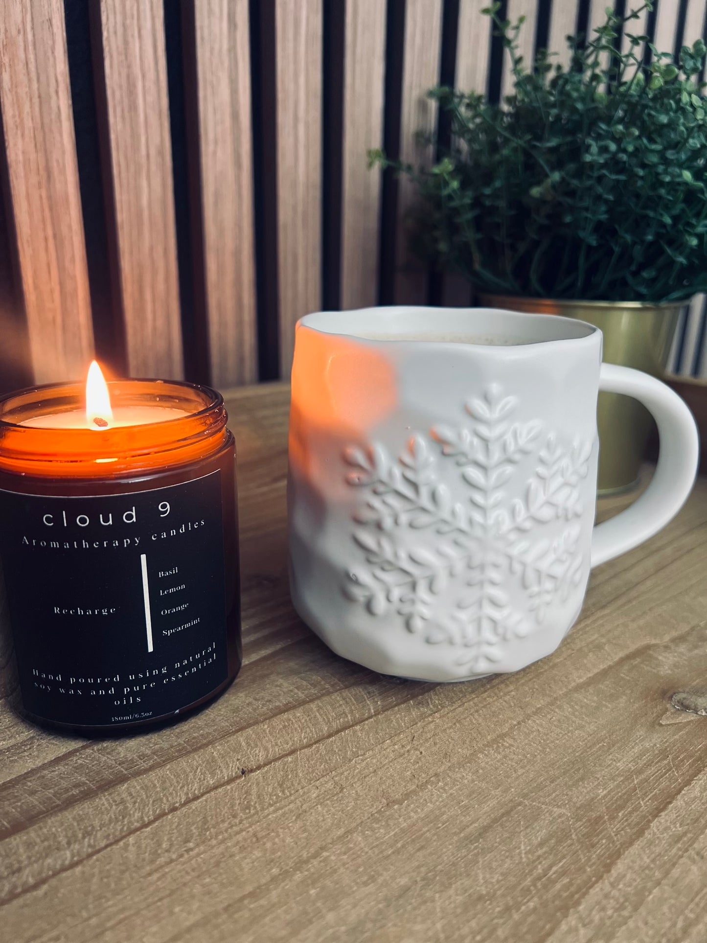 Mood-boosting cadle burning in a cozy home setting with natural light