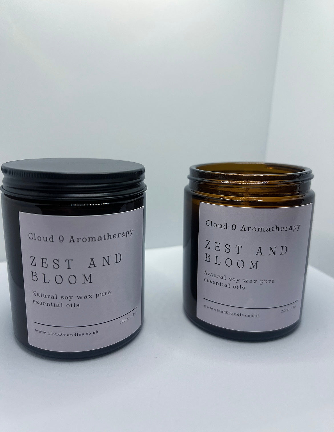 Luxury 180ml Zest & Bloom candle in glass jar, featuring mood-boosting essential oil blend for home relaxation.