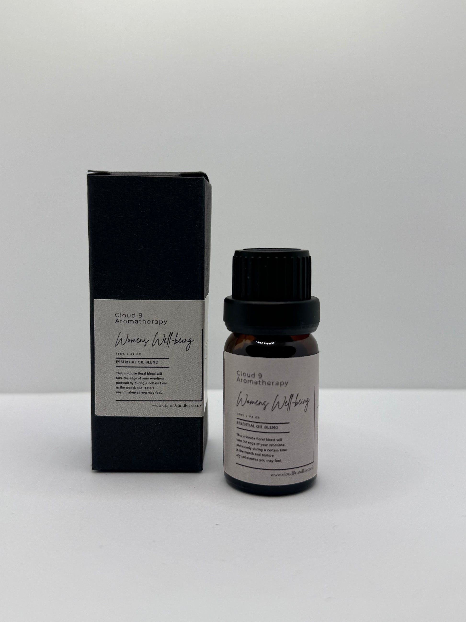 Women’s Well-Being 10ml essential oil blend bottle styled with soft natural lighting, representing self-care, stress relief, and hormonal balance.