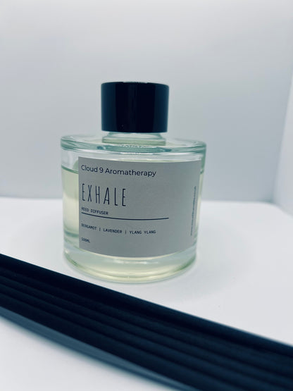 Calming Exhale reed diffuser placed in peaceful home setting for aromatherapy and relaxation 