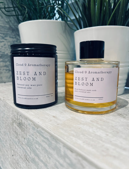 Cloud 9 Aromatherapy Zest & Bloom candle burning, creating a calming and fragrant atmosphere at home.