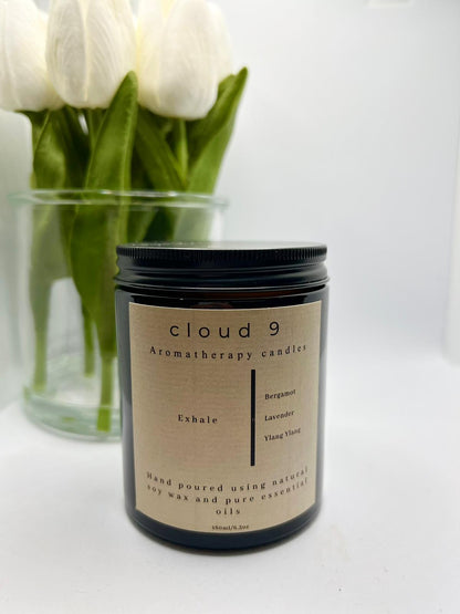 Exhale soy candle with bergamot, lavender and ylang ylang essential oils in amber glass jar