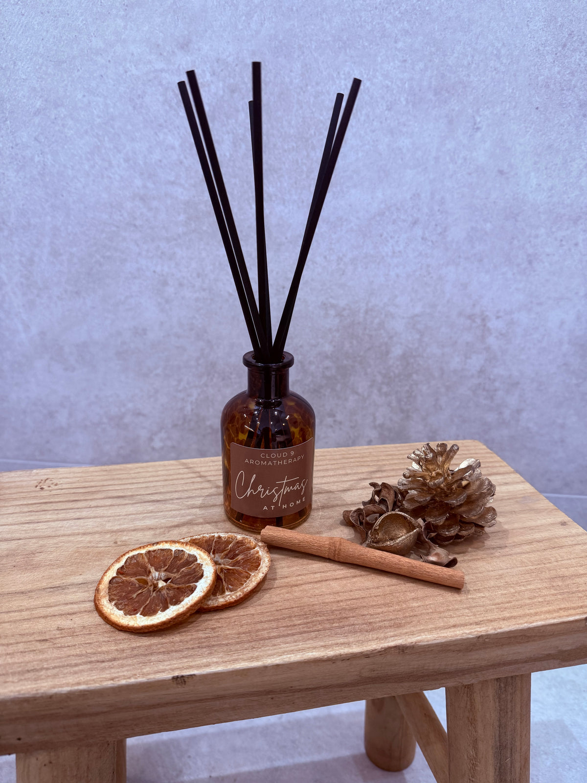 Christmas at Home reed diffuser by Cloud 9 Aromatherapy with a festive cinnamon, clove and sweet orange fragrance.